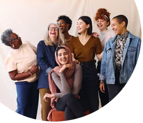 Portrait of cheerful mixed age range multi ethnic women celebrating International Women's Day